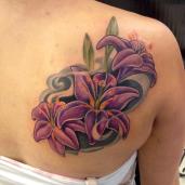 Purple lily shoulder piece, love the use of color in this